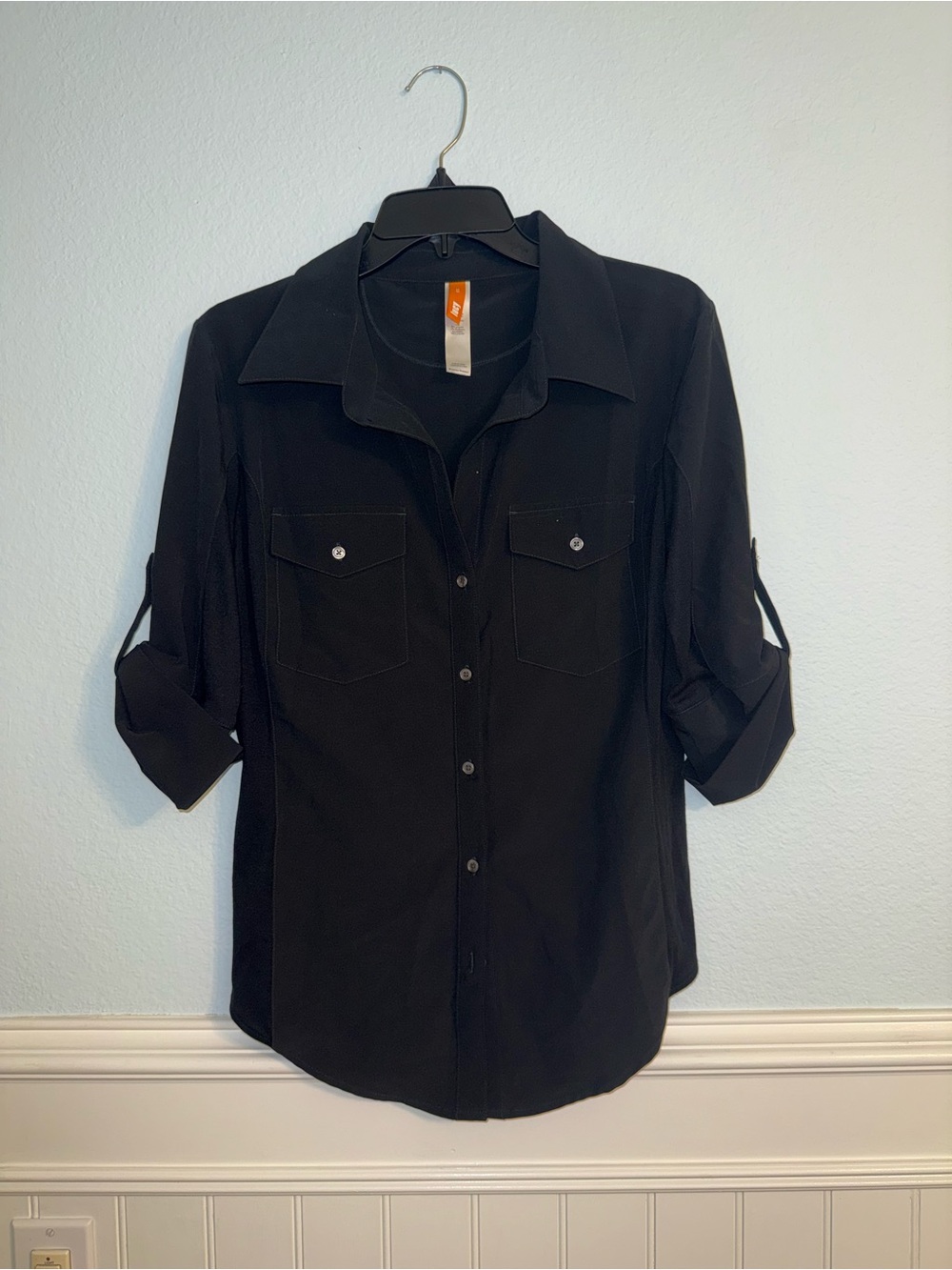 Lucy Black Active Top with Orange Brand Tab